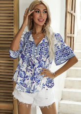 Bluse mit Knopfleiste und Bindeband